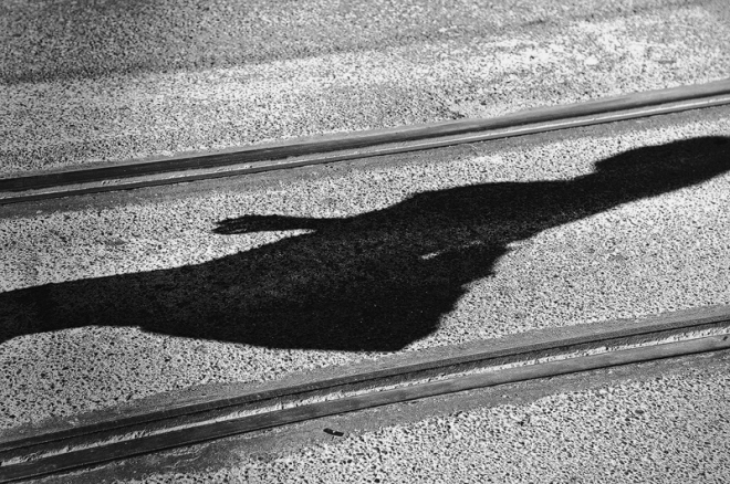 tram lines and woman shadow